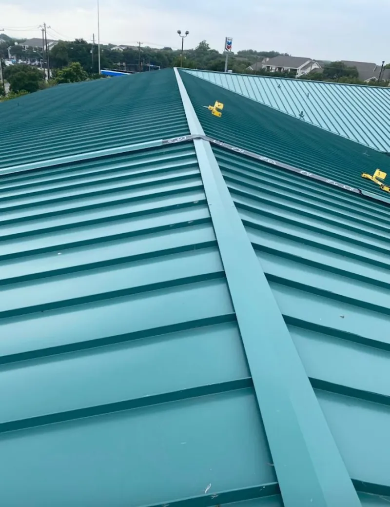Green commercial metal roof ridge and valley for Metal Roof Repair in Flowood